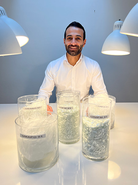 Portrait of Beway Bakir in front of our products.